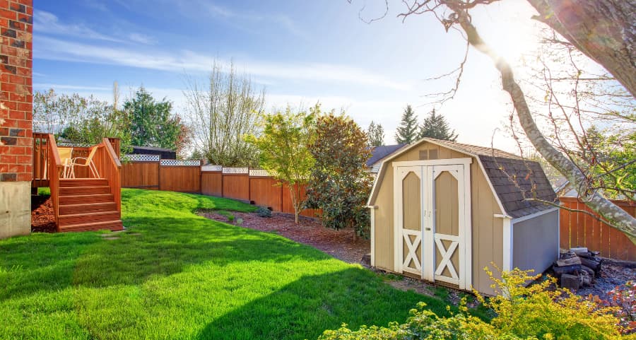 Fenced backyard with storage shed in Missoula